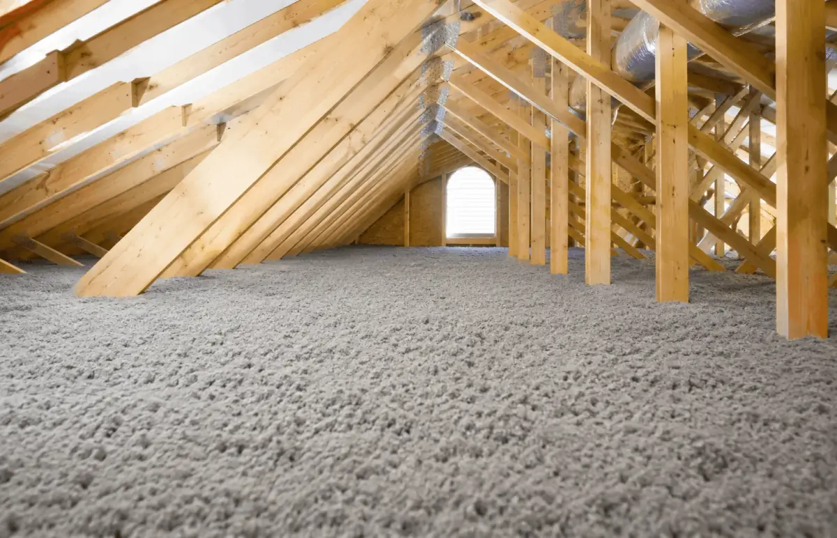 Cellulose insulation densely packed in an attic
