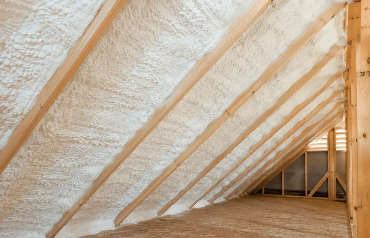 Closed-cell spray foam insulation applied to an attic roofline